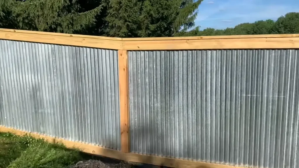 Corrugated metal fence